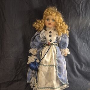 Elegant Blue and White Porcelain Doll
